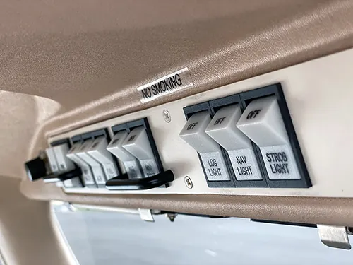 Overhead lighting switches in VH-OKY
